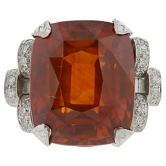 Platinum GIA Certified 25.56 Carat Orange Sapphire and Diamond Ring