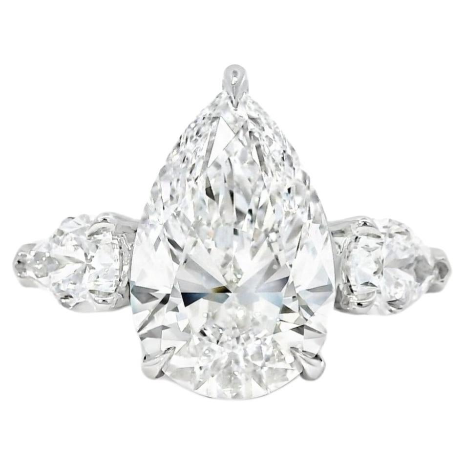 Platinum GIA Certified 7.48ctw Pear Cut Natural Diamond 3 Stone Ring