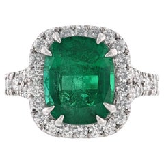 Platin GIA zertifizierter Beryll Smaragd Diamant Halo Ring