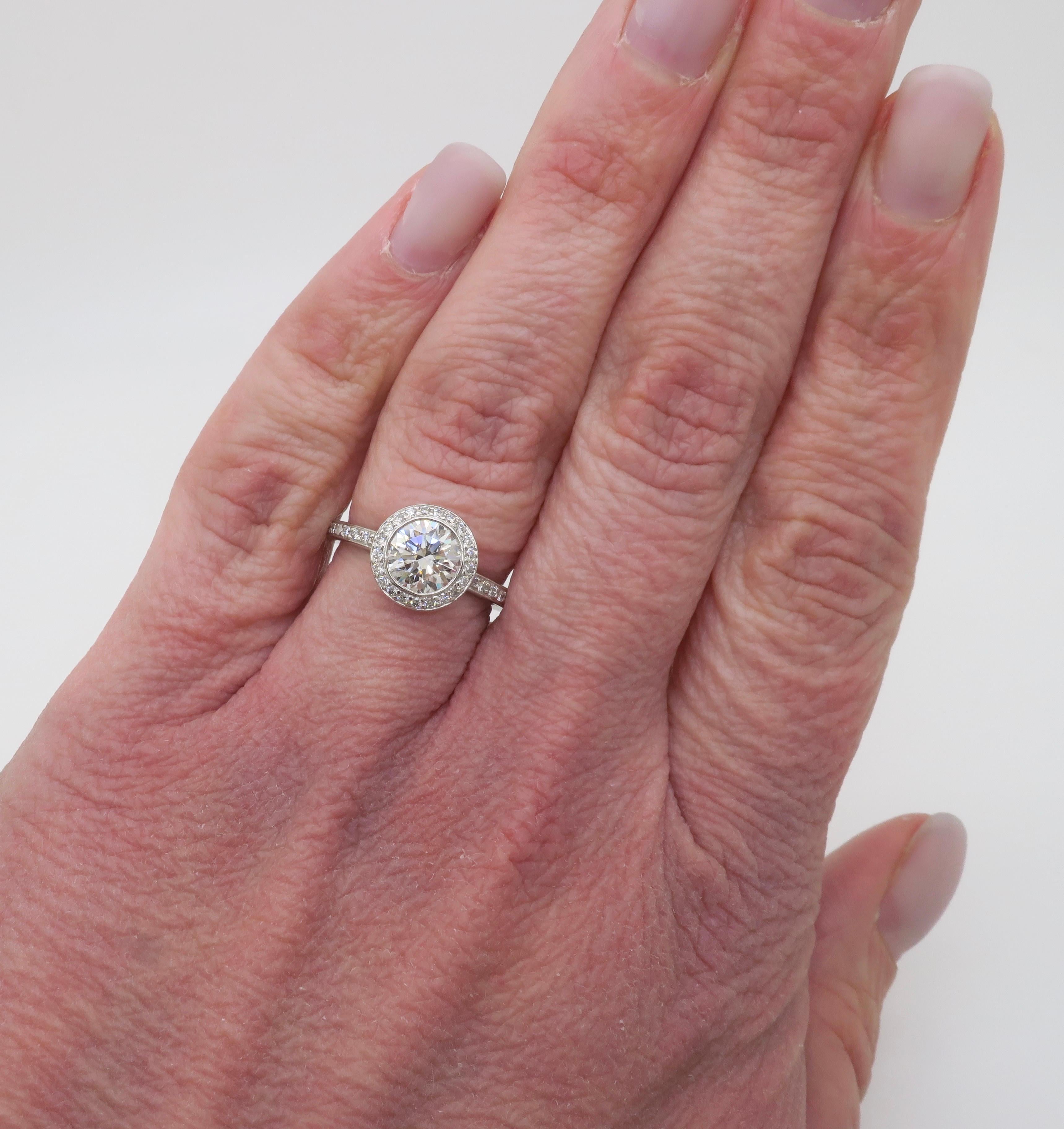 Platinum Ritani diamond ring with a GIA certified 1.03ct Round Brilliant cut diamond. 

Center Diamond Carat Weight: 1.03ct Earth Mine
Center Diamond Cut: Round Brilliant Cut 
Center Diamond Color: H
Center Diamond Clarity: SI1
Certification: GIA -