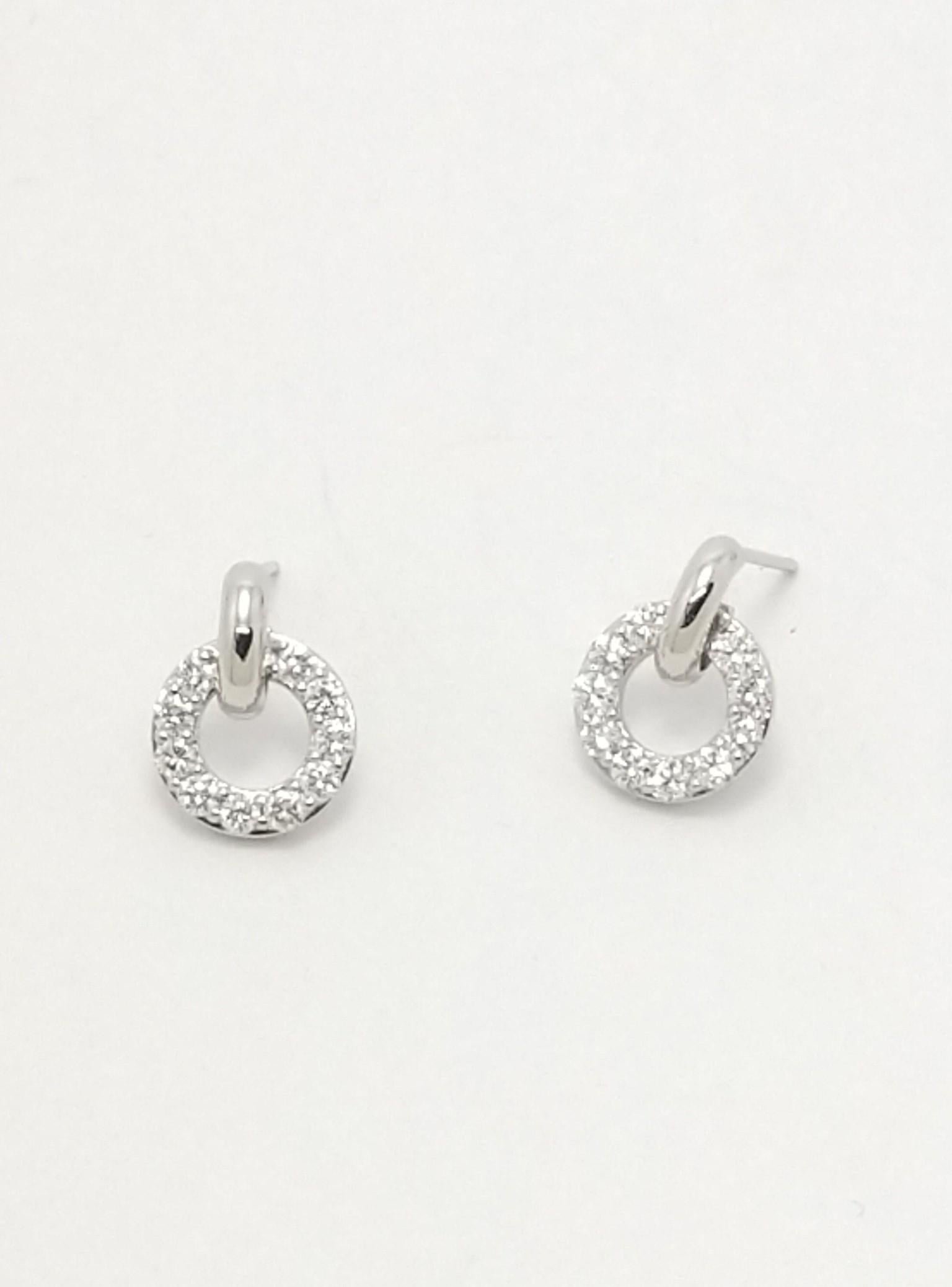 Platinum Petite Diamond  Hoop Dangle Earrings, Tiffany designer , Thomas Kurilla keeping it practical in staying elegant. These are tiny but mighty. The hoop earring 14mm x 10.5 mm diameter. All day elegance, day into evening, no problem.  the