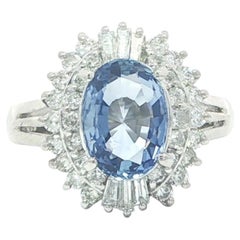 Platinum GIA Elongated Oval No Heat Ceylon Sapphire w/ Diamond Cluster Halo Ring