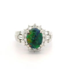 Platinum GIA Graded 2.27ctw Oval Cut Black Opal & Diamond Cocktail Ring