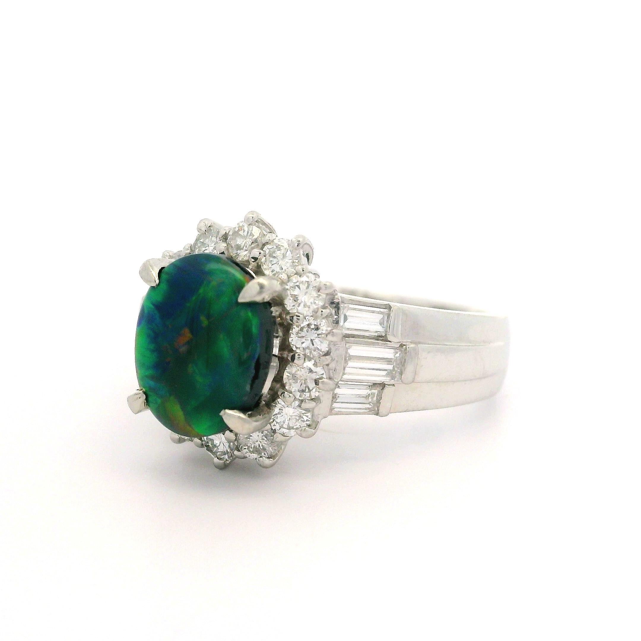 Platinum GIA Graded 2.27ctw Oval Cut Black Opal & Diamond Cocktail Ring In Excellent Condition For Sale In Montclair, NJ