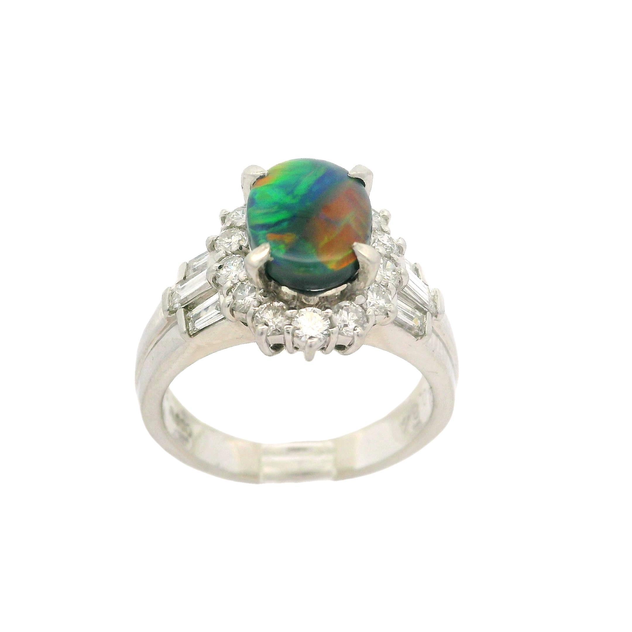 Platinum GIA Graded 2.27ctw Oval Cut Black Opal & Diamond Cocktail Ring For Sale 3