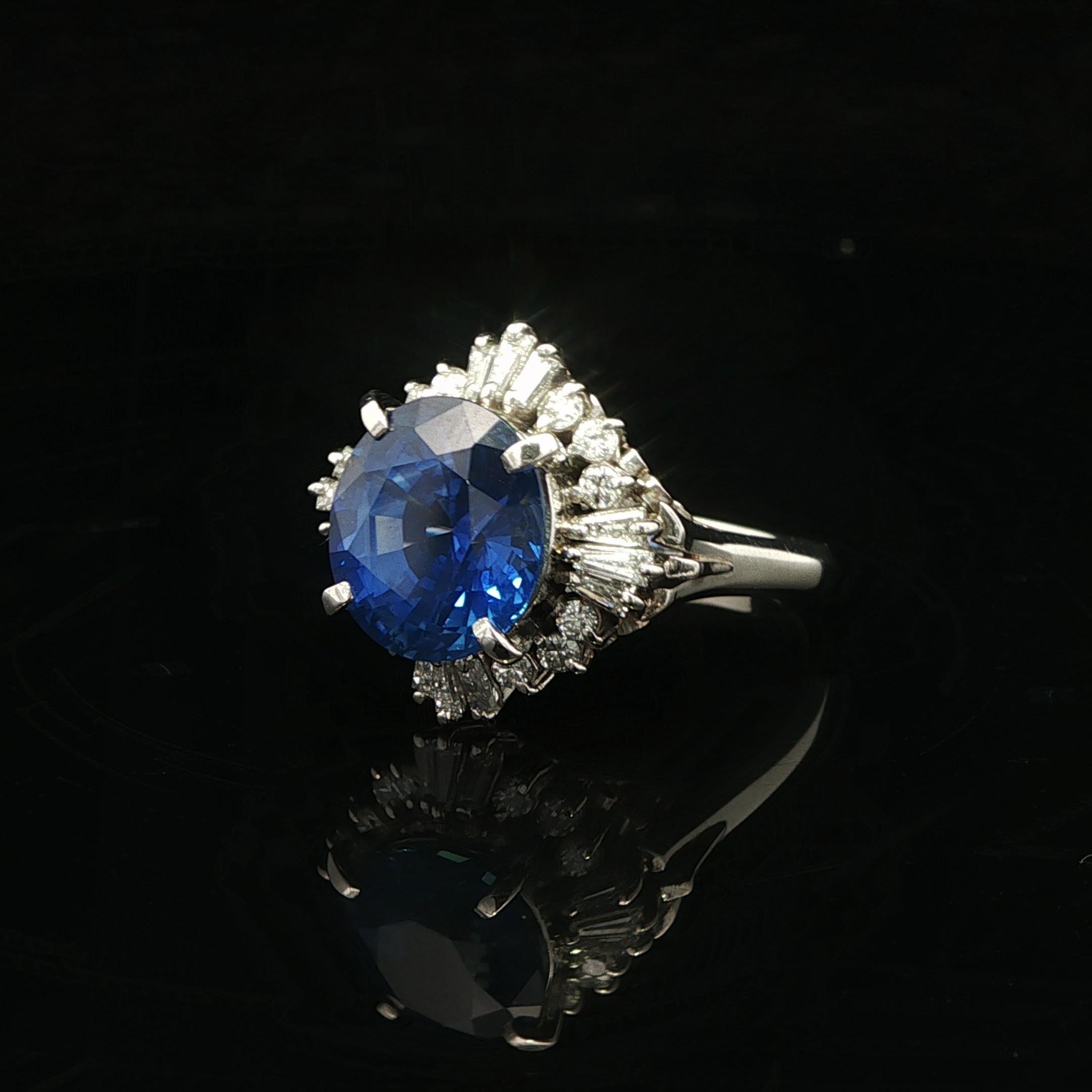 --Stone(s):--
(1) Natural Genuine Sapphire - Oval Brilliant Cut - Prong Set - True Royal Blue Color - Heated - Ceylon - 5.33ct (exact)
** See Certification Details Below for Complete Info **
Numerous Natural Genuine Diamonds - Round Brilliant &