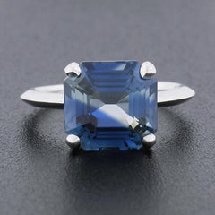 Platinum GIA No Heat 6.21ctw Zoned Greenish Blue Emerald Cut Sapphire Ring