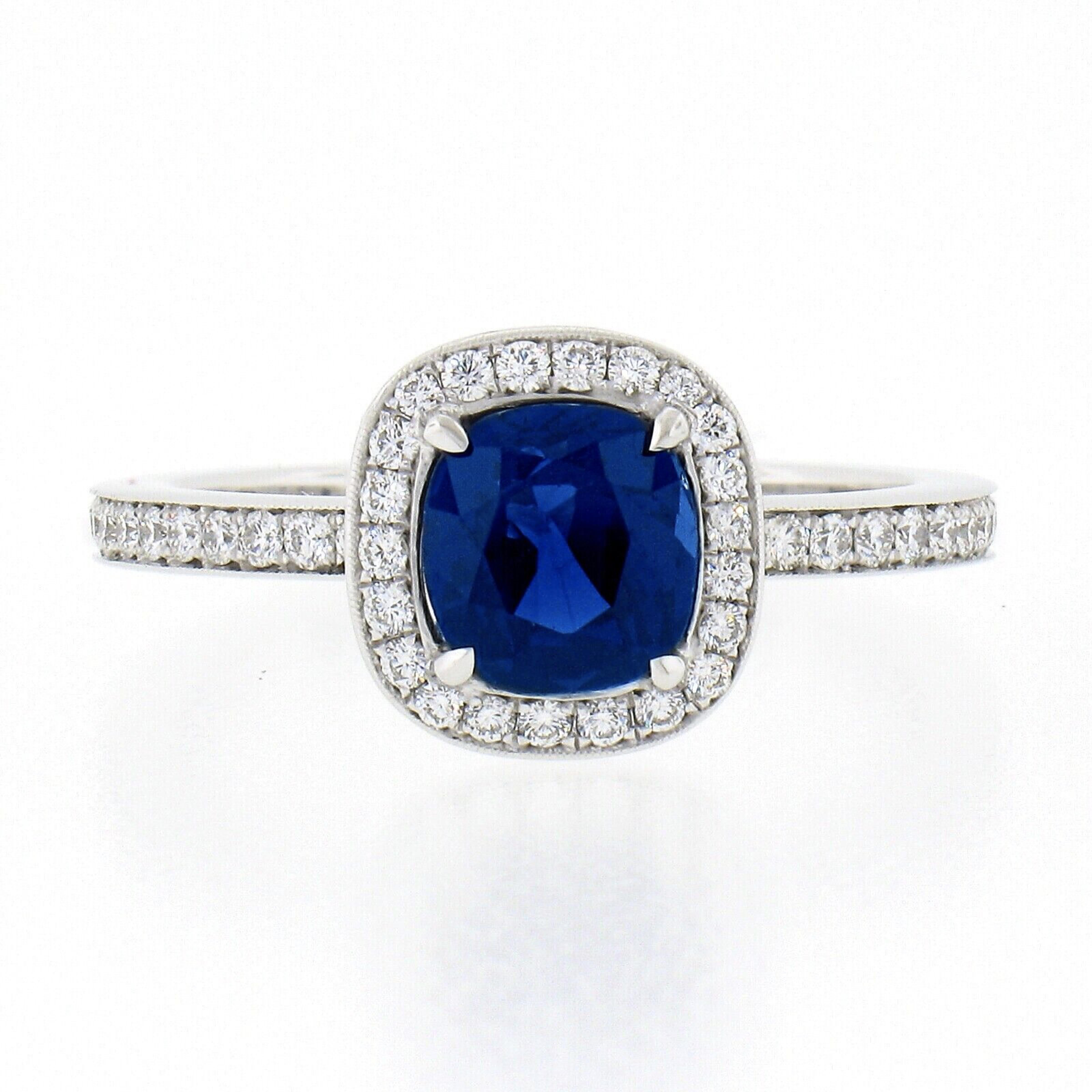 Platinum GIA No Heat Cushion Sapphire Solitaire w/ Diamond Halo Engagement Ring In Good Condition For Sale In Montclair, NJ