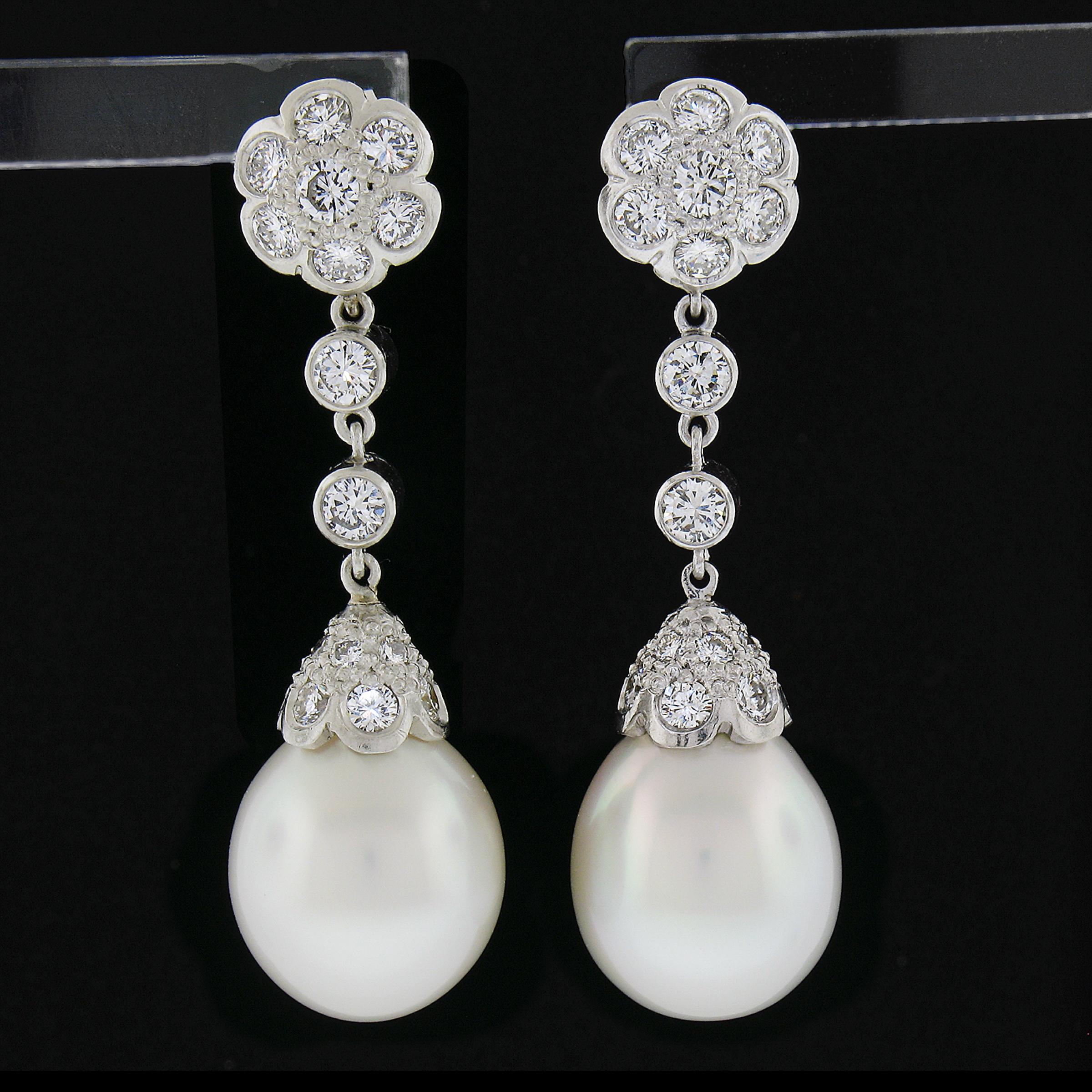 --Stone(s):--
(2) Genuine Cultured South Sea Saltwater Pearls - Drop Shape - White Color w/ Orient Overtones - 12.17mm & 12.24mm (exact - certified)
** See Certification Details Below for Complete Info **
(42) Natural Genuine Diamonds - Round