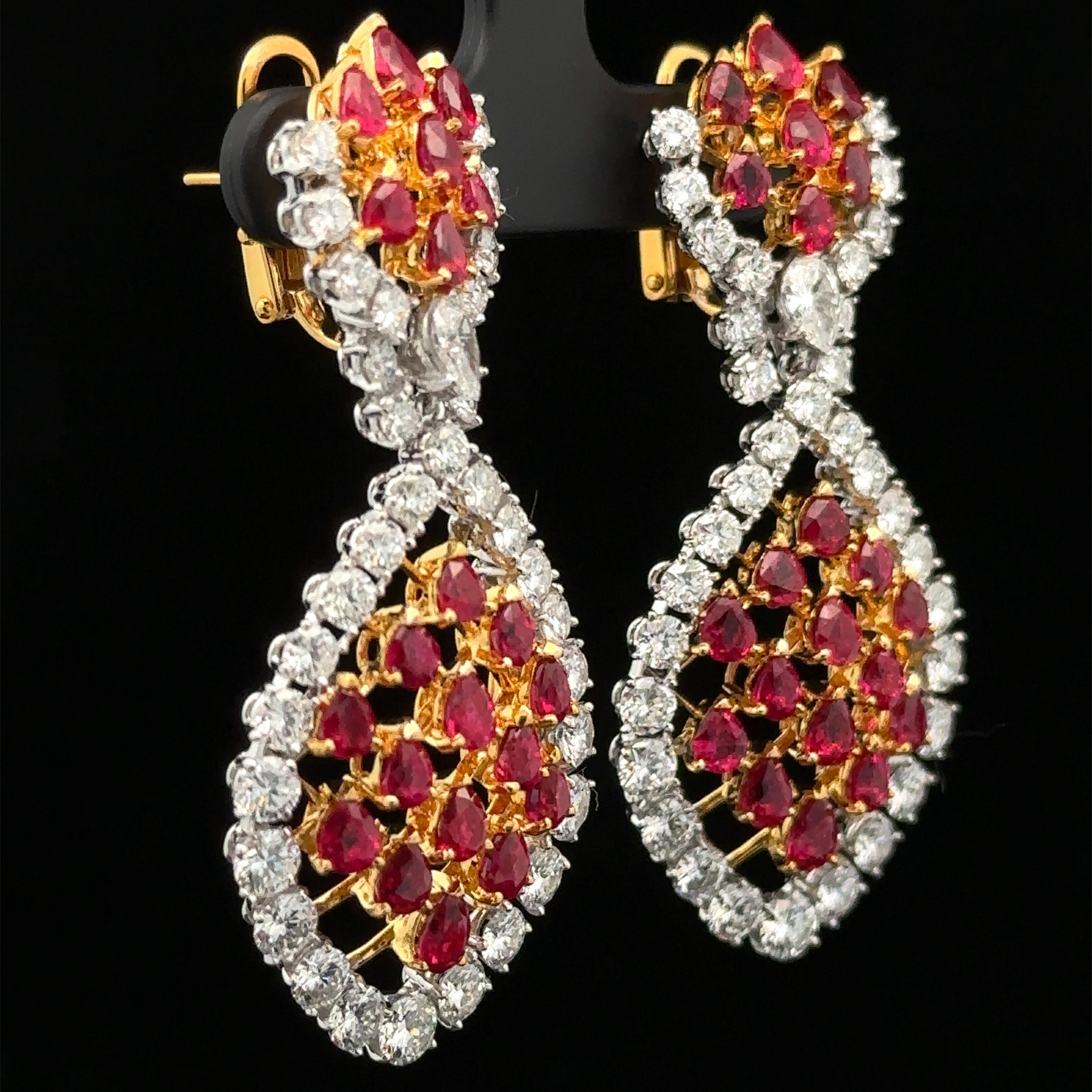 --Stone(s):--
(42) Natural Genuine Rubies - Pear Cut - Prong Set - Vivid Red Color - Burma - Heated - Gorgeous Quality - 9.17ctw (exact)
** See Certification Details Below for Complete Info on the Rubies **
(70) Natural Genuine Diamonds - Pear &