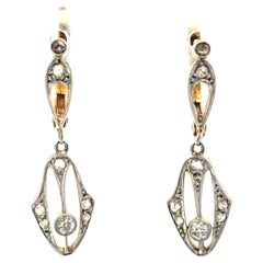 Orecchini in oro platino Art Deco con diamanti a penzoloni