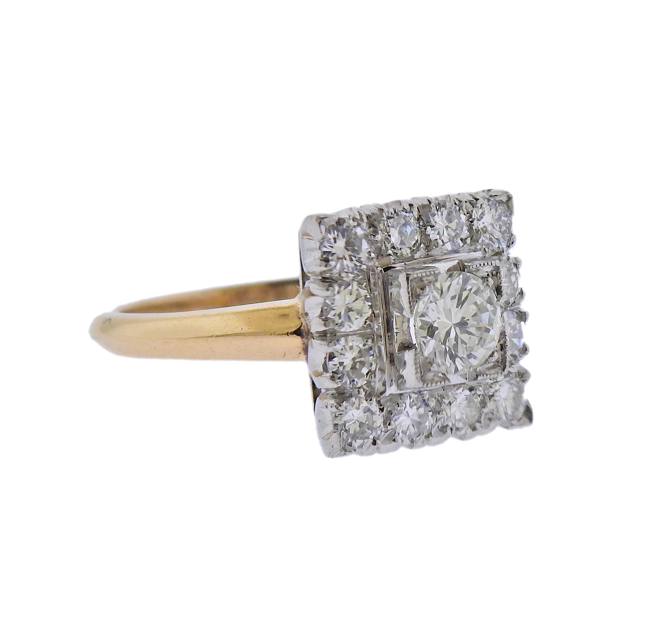 14k gold and platinum ring, set with approx. 0.47ct center diamond, surrounded with approx. 0.84ctw in surrounding diamonds. Ring size - 6, ring top - 12mm x 12mm. Marked Plat 14k. Weight - 6.4 grams. 