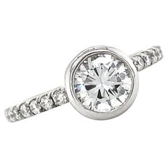 Bague de fiançailles en platine et or avec diamant de 0,73 carat serti sur le chaton, certifié GIA, E-VS1