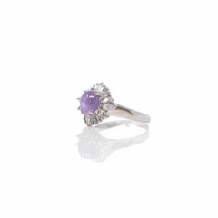 Anello in oro platino con zaffiro rosa naturale e diamanti