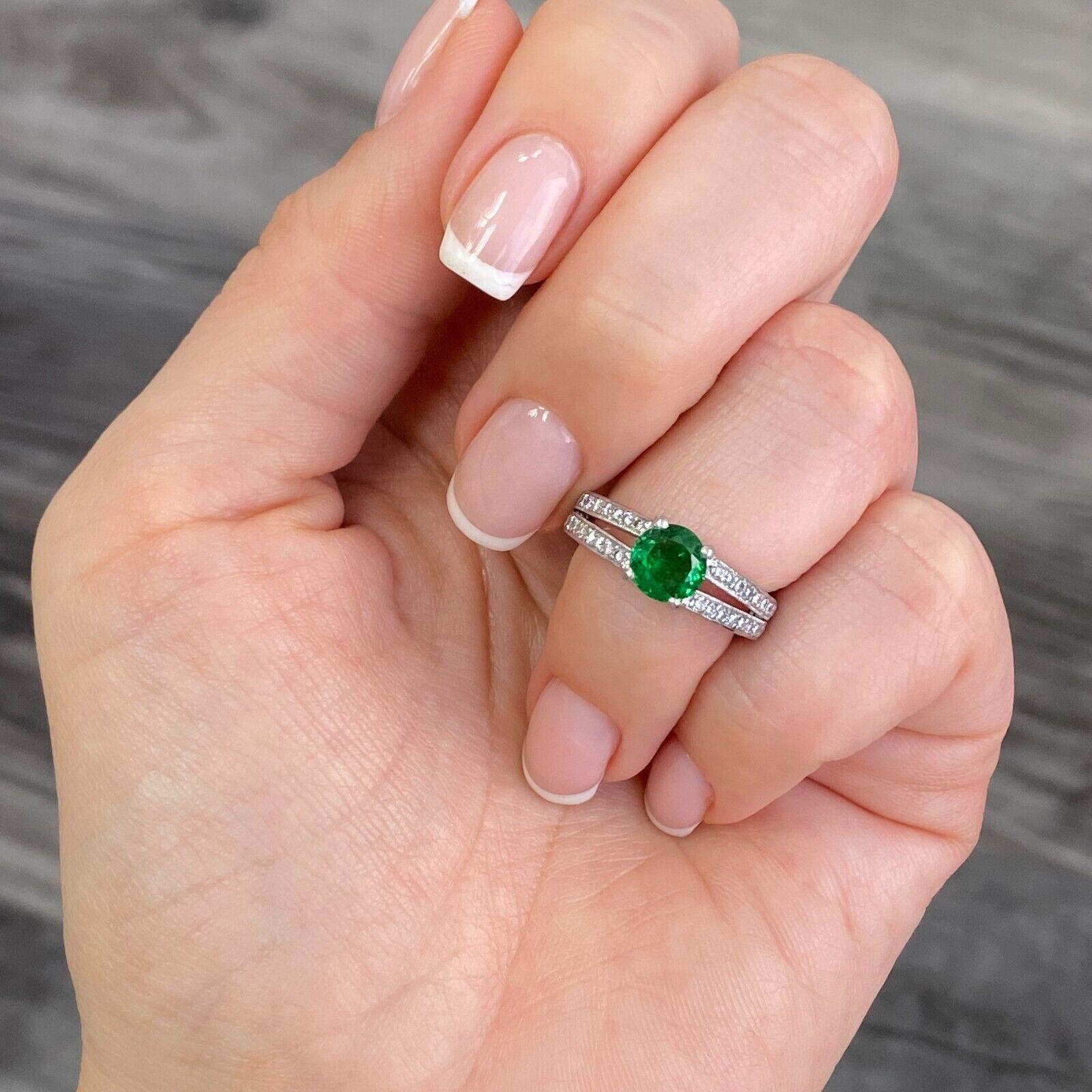 Specifications:
Pre-Owned (Great condition)
Metal: Platinum
Weight: 8.6 Gr
Main Stone: 1.16 Round Cut Tsavorite
Side stones: Approx. 0.49ctw Diamonds
Color: GH
Clarity: VS
Size: 4.75 US