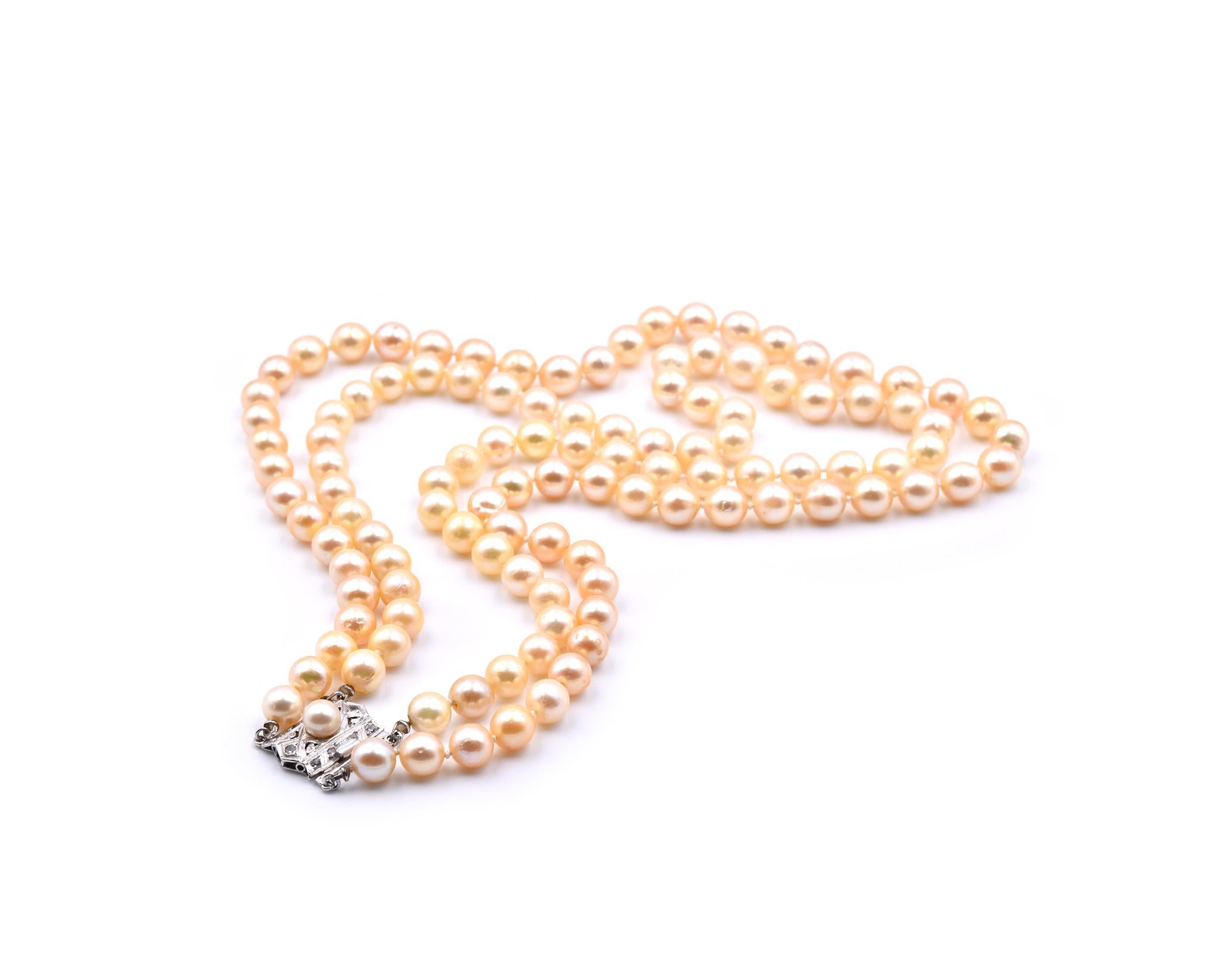 Designer: custom design 
Material: platinum
White Sapphires: 10 round cut=.30cttw
Pearls: 7.5mm
Dimensions: necklace is 19-inches long 
Weight: 89.21 grams
