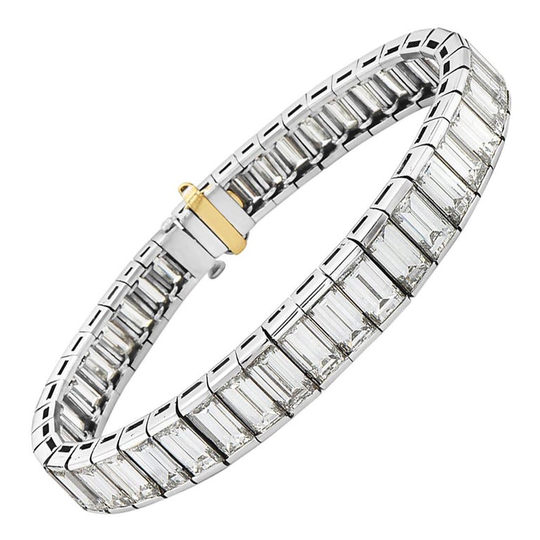 Platinum Graduated Baguette Tennis Bracelet For Sale at 1stDibs