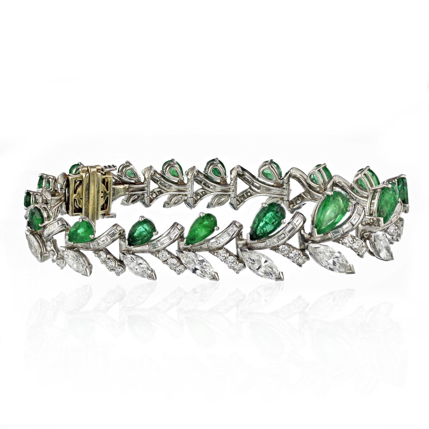 Step into the timeless allure of the 1950s-60s with this exquisite platinum bracelet. A symphony of elegance, it showcases pear-cut green emeralds harmoniously intertwined with 12 carats of brilliant, high-quality diamonds (marquise cuts, baguette