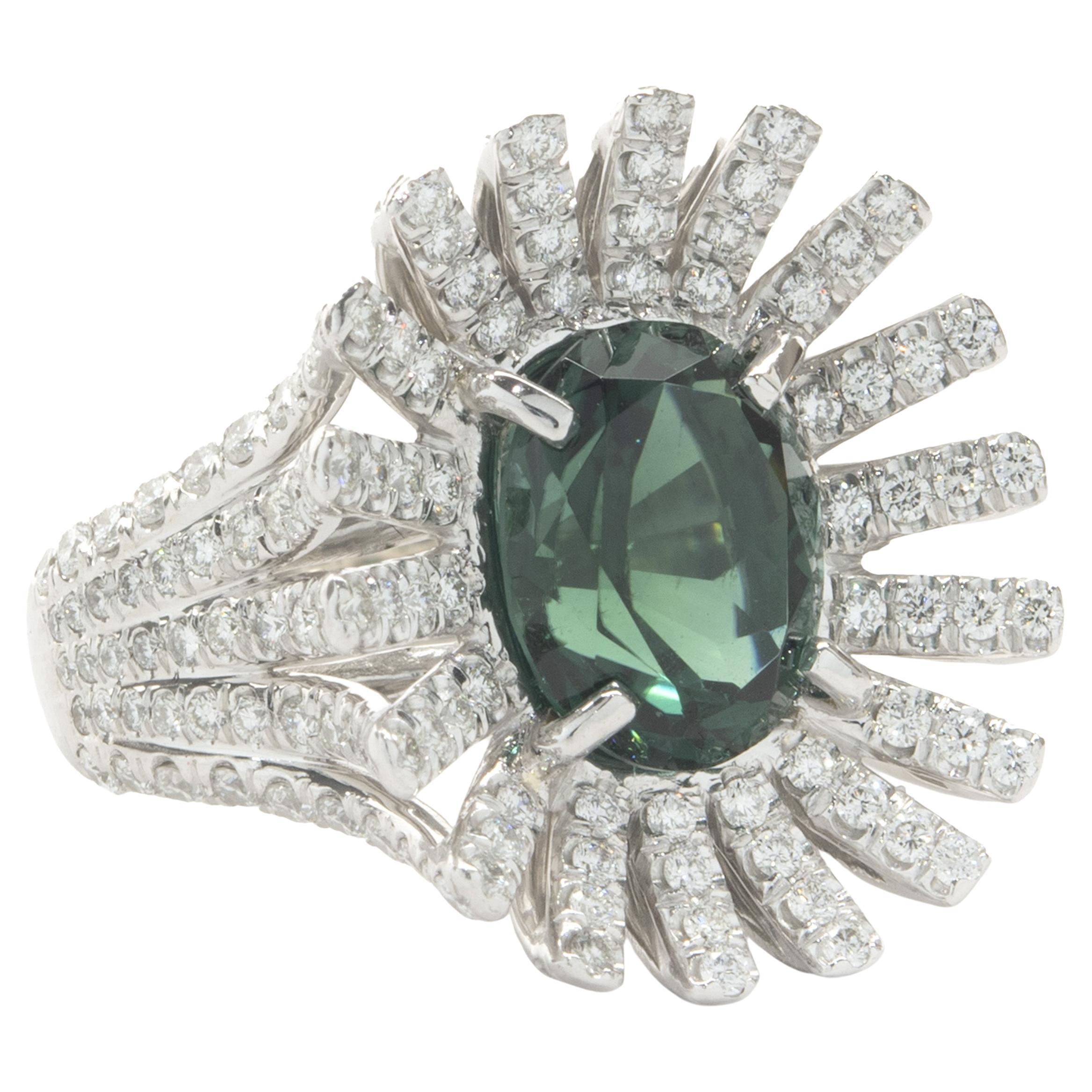 Designer: custom
Material: Platinum
Diamond: 154 round brilliant cut = 1.50cttw
Color: G
Clarity: VS2
Green Tourmaline: 1 oval cut = 2.93ct
Dimensions: ring top measures 20.80mm long
Ring Size: 5.5 (complimentary sizing available)
Weight: 15.20