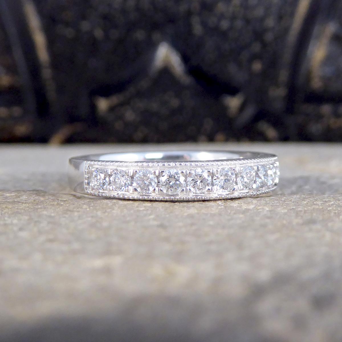 Celebrate everlasting love with our Platinum half eternity ring, featuring 0.50ct of brilliant cut diamonds. This ring is meticulously crafted from the finest platinum, known for its durability and elegant sheen, providing a perfect backdrop for the