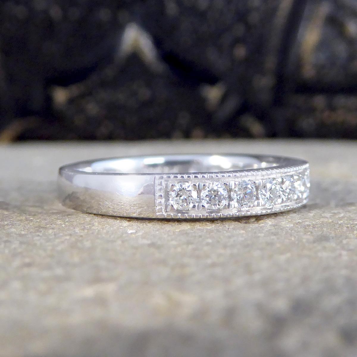 Modern Platinum Half Eternity Ring with 0.50ct Brilliant Cut Diamond For Sale