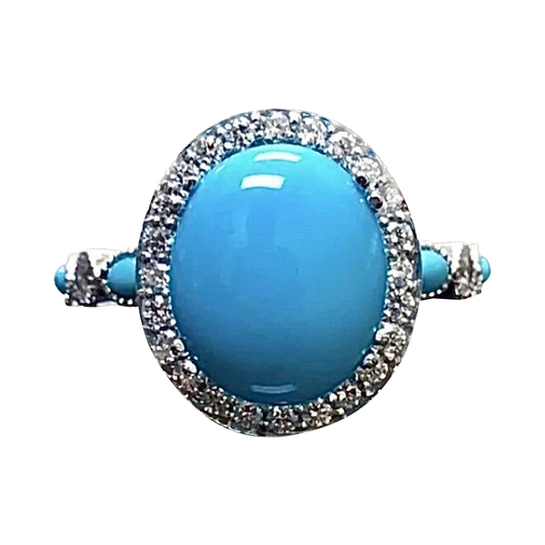 Anello di fidanzamento in platino con diamante a raggiera e turchese ovale della Bella Addormentata
