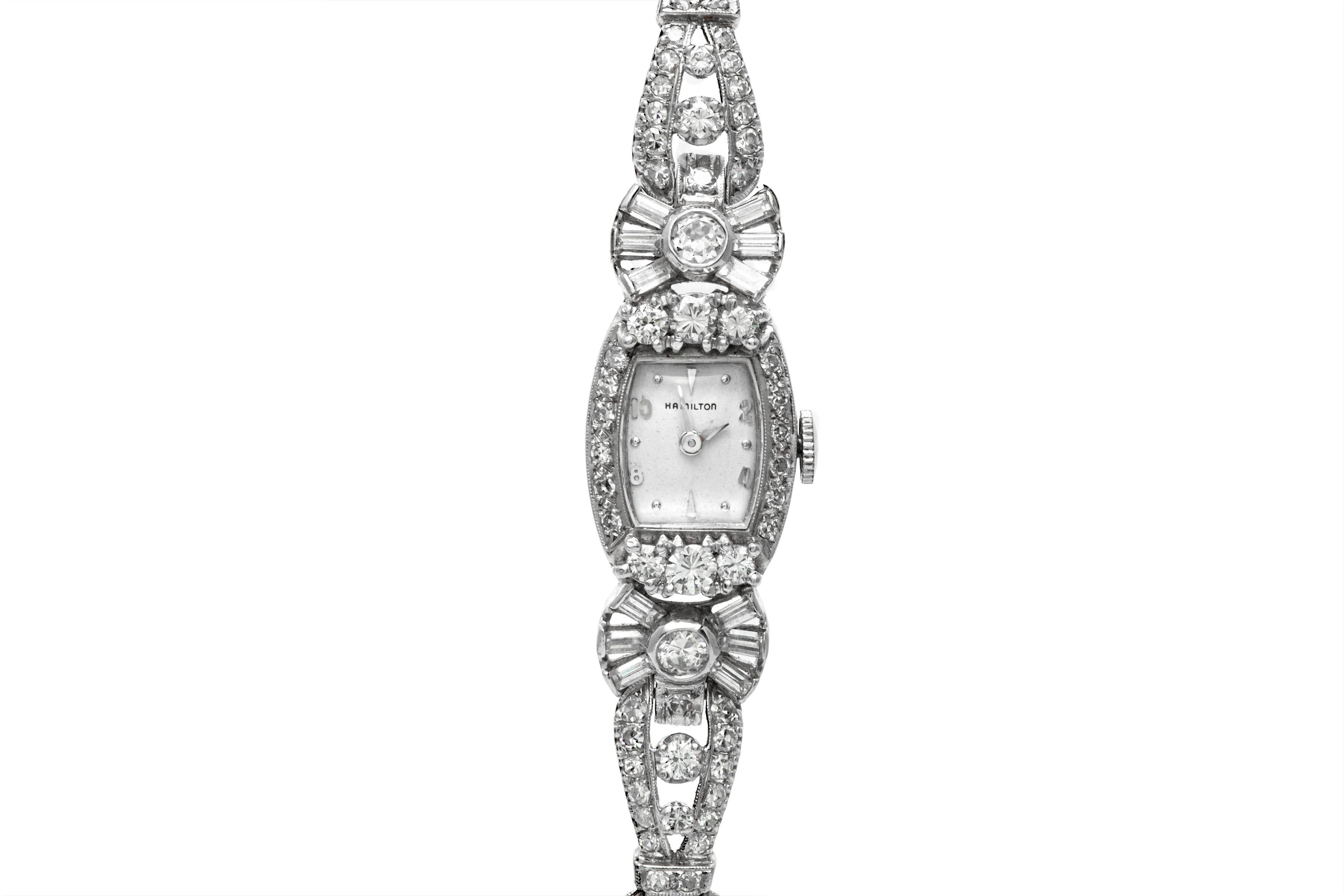 Hamilton watch, finely crafted in platinum with diamonds weighing approximately a total of 8.00 carat. Circa 1930's.
