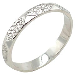 Fede nuziale a 8 lati incisa a mano in platino