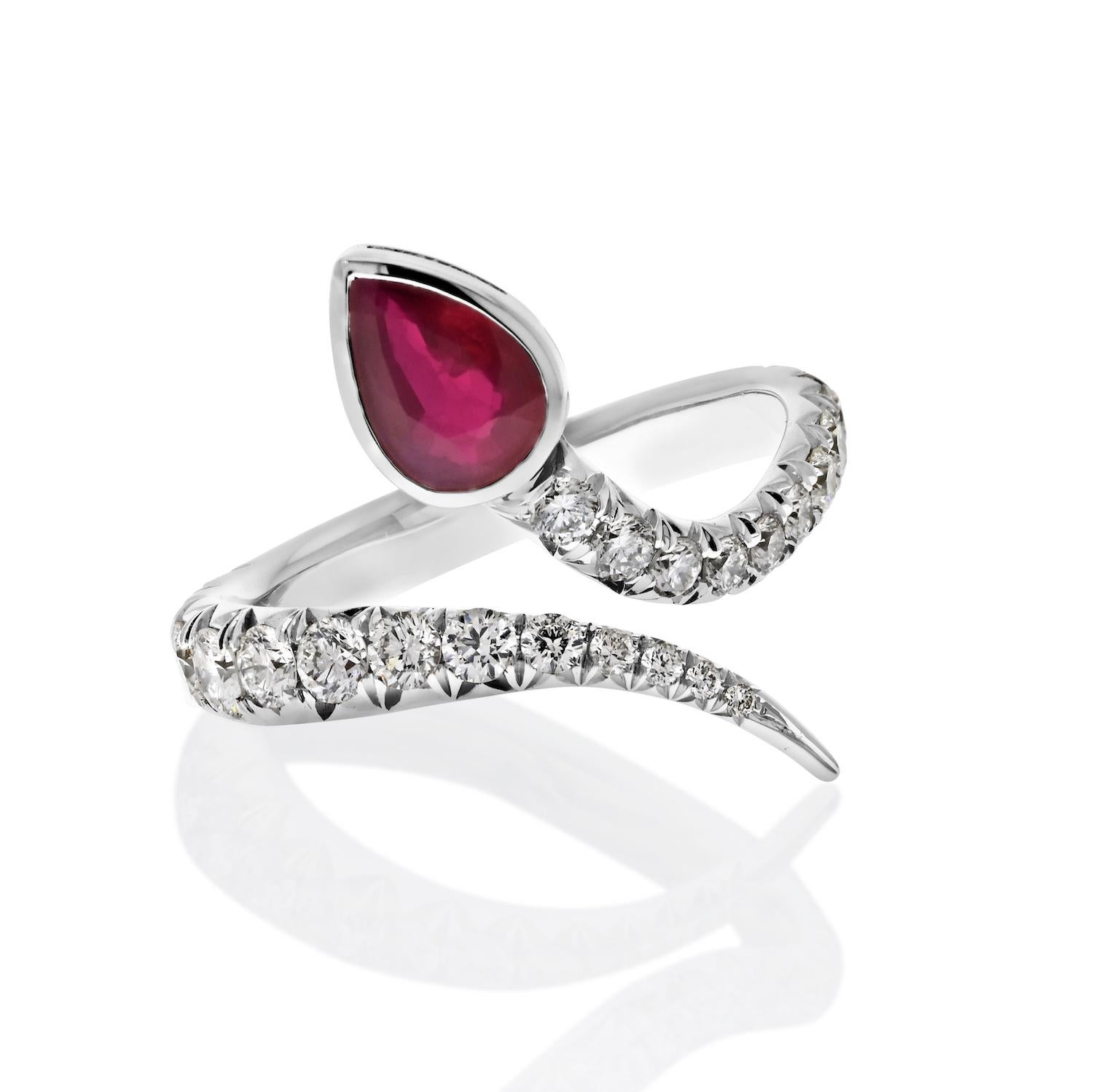 Unveiling the Majestic Serpent: Platinum Diamond and Ruby Wrap Serpent Handmade Ring
Step into a world of enchantment with this exquisitely handcrafted platinum ring. The design encapsulates the grace and allure of a serpent elegantly wrapping