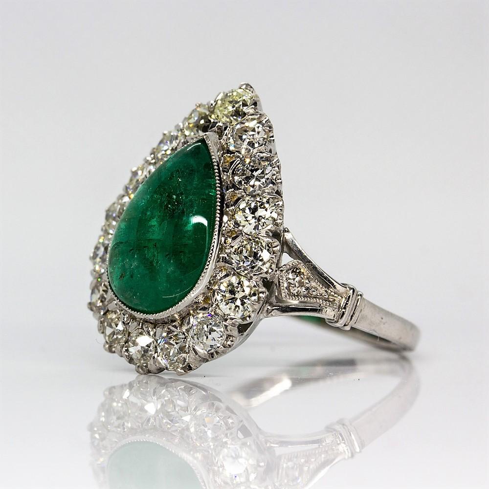 Women's or Men's Platinum Handmade Emerald and Diamonds Halo Ring For Sale