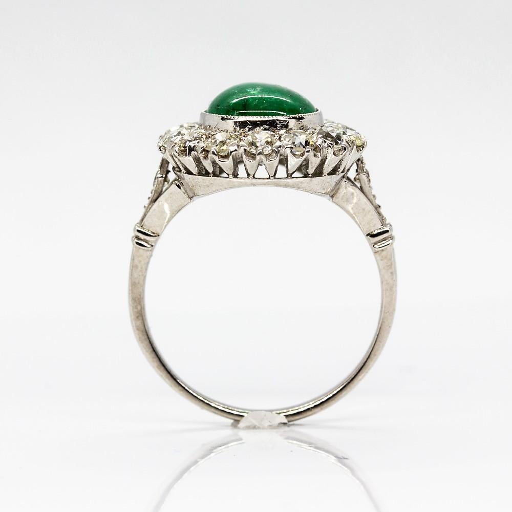 Platinum Handmade Emerald and Diamonds Halo Ring For Sale 1