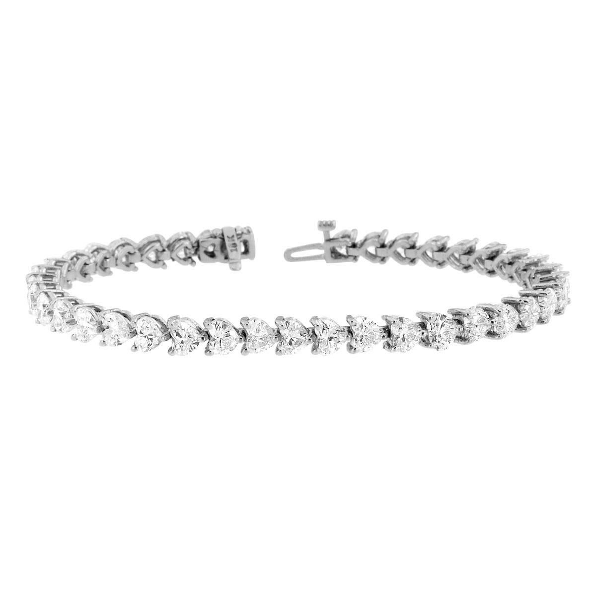 This timeless four prongs diamonds tennis bracelet feature 39 perfectly matched Heart Shape Diamonds. Experience the Difference!

Product details: 

Center Gemstone Type: NATURAL DIAMOND
Center Gemstone Color: WHITE
Center Gemstone Shape: