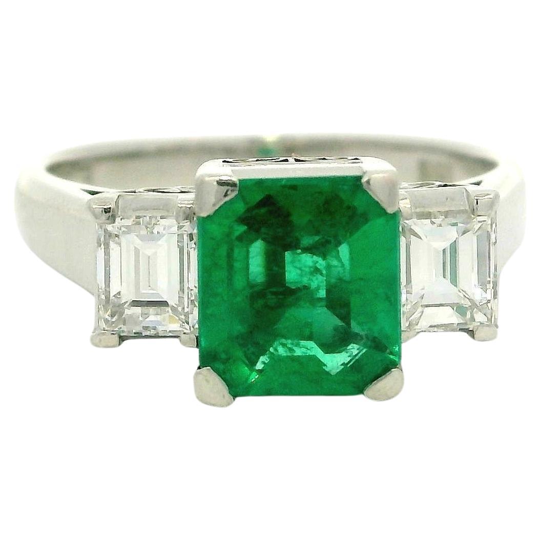 Platinum High Quality GIA 1.57ctw Step Emerald & Diamond Sides 3 Stone Ring For Sale