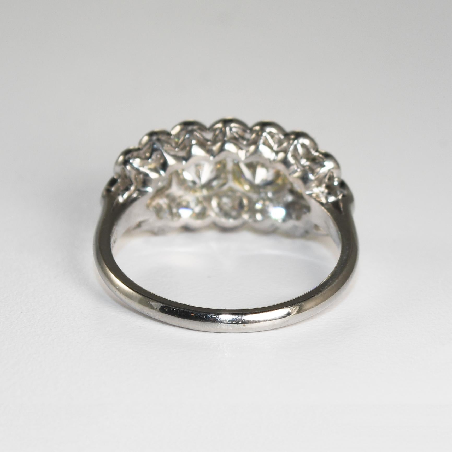 Ladies' vintage diamond ring in platinum and iridium setting.
Using an XRF metals analyzer, the ring tests 85% platinum, 10% iridium ,and 5% palladium and weighs 3.8 grams gross weight.
All but one diamond are old-cuts, 1.35 total carats, I to J