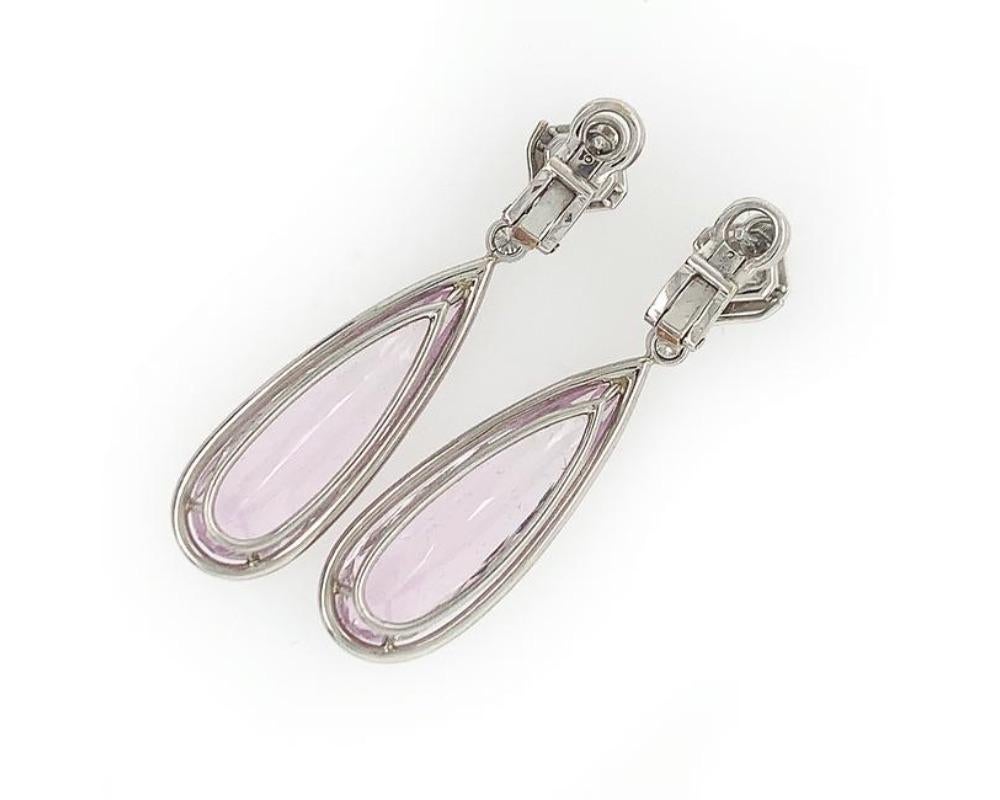 Platinum kunzite diamond drop earrings, two long pear shape kunzite weighing approx. 22.00 cts, 2 square cut diamonds weighing approx. 1.00 ct GH VS, the rest of the RBC diamonds weighing approx. 2.15 cts, GH VS, measures 2 x 1/2 inch, weight 9.6 dwt