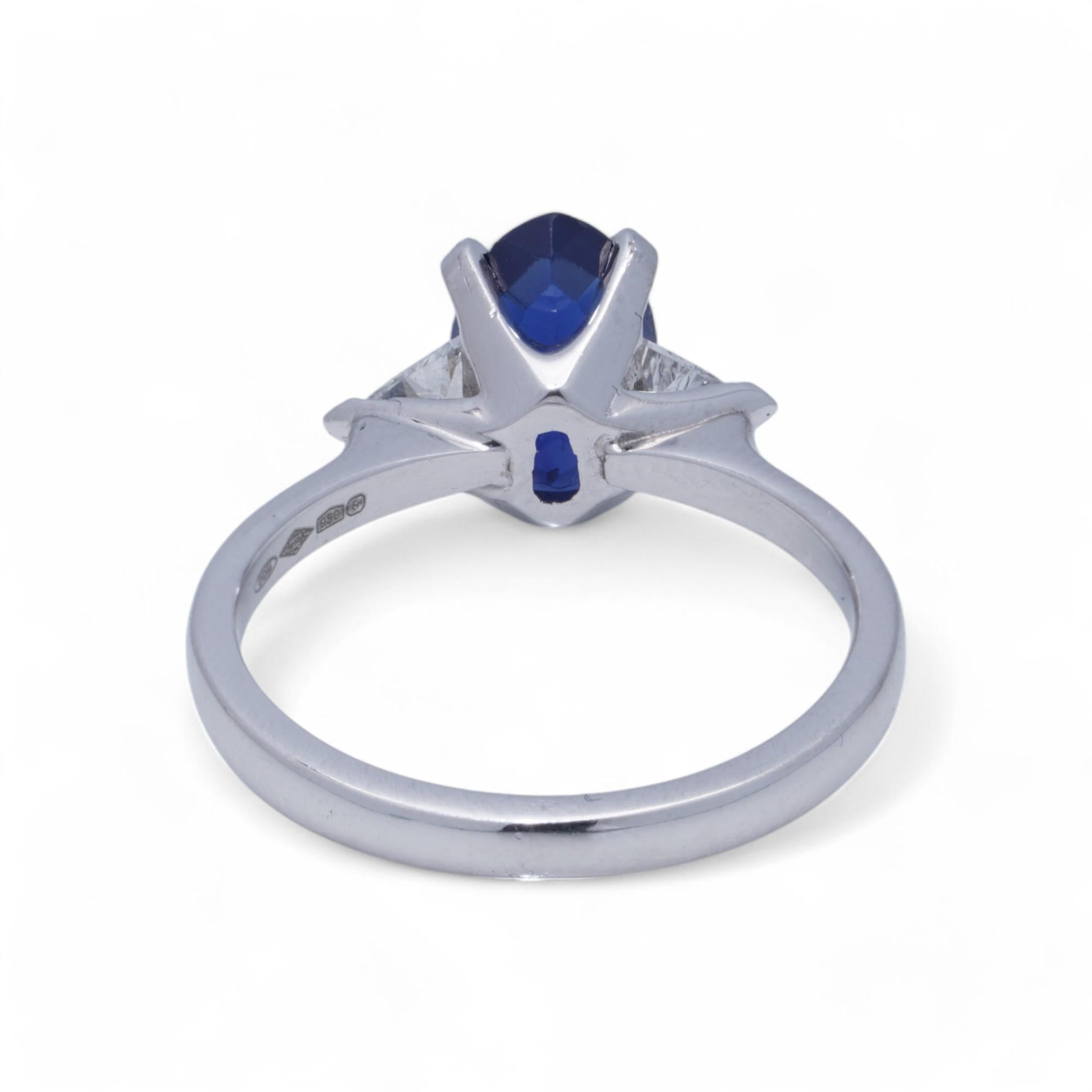 Women's Platinum Ladies Ring with Blue Sapphire and Trillion Cut Diamonds For Sale