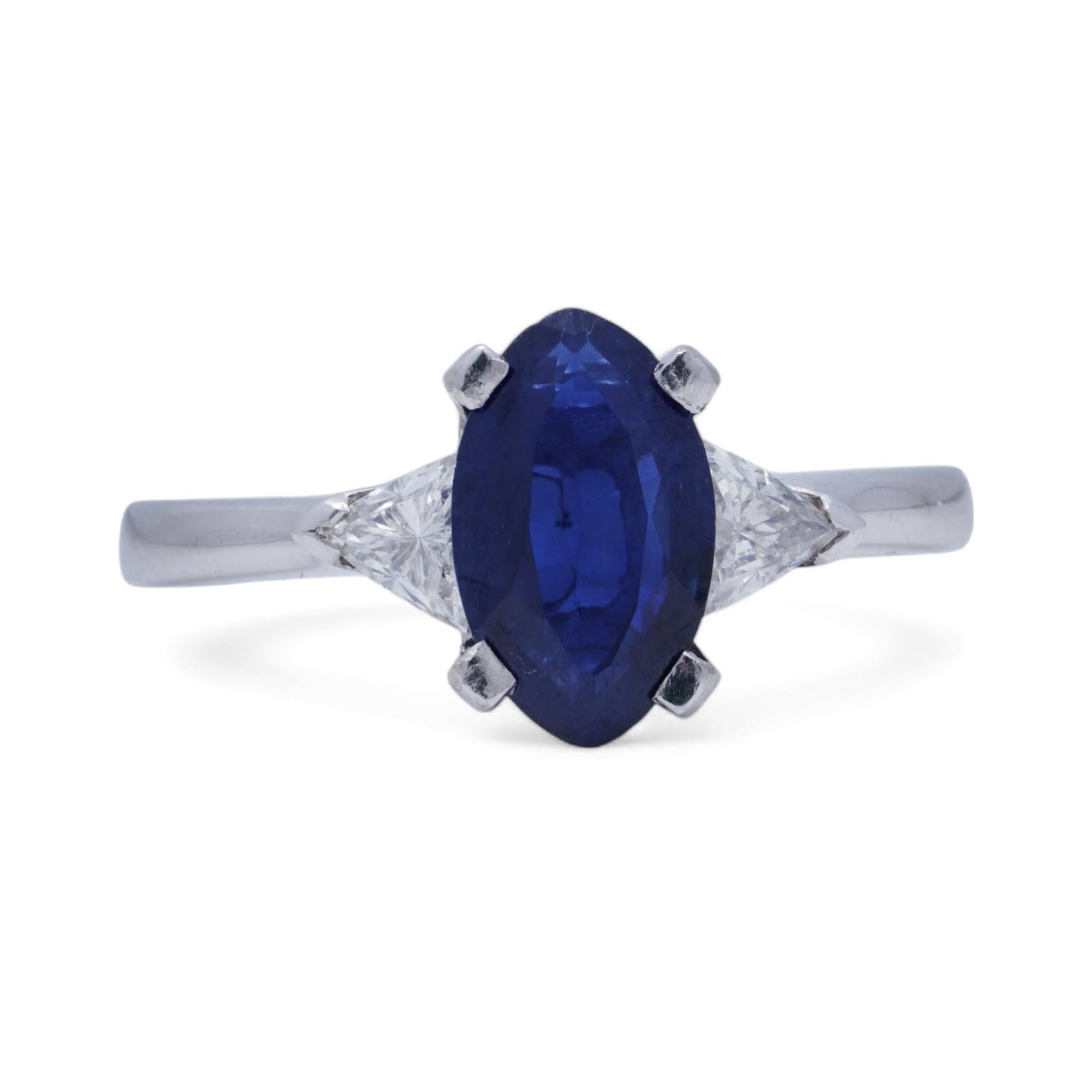 Platinum Ladies Ring with Blue Sapphire and Trillion Cut Diamonds For Sale 2