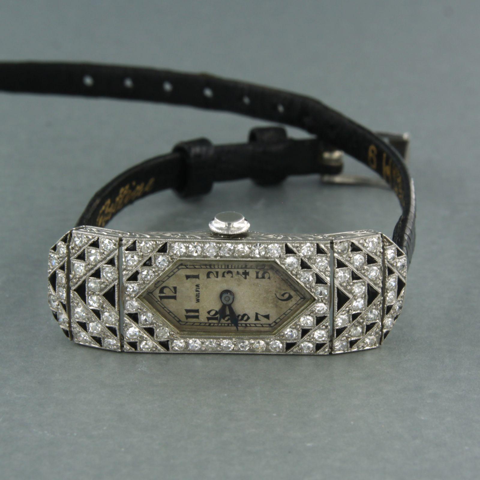 Platinum ladies watch decorated with enamel and set with old single cut diamonds up to 1.00ct - F/G - VS/SI

detailed description:

The movement of the watch is an anchor escapement and is fully jewelled. Movement has been overhauled and runs well.