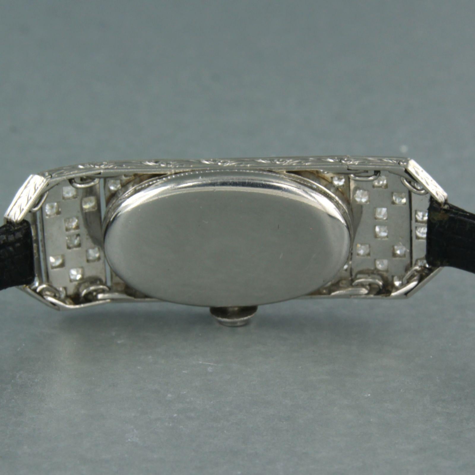 Art Deco Platinum ladies watch decorated with enamel and with old single cut diamonds For Sale