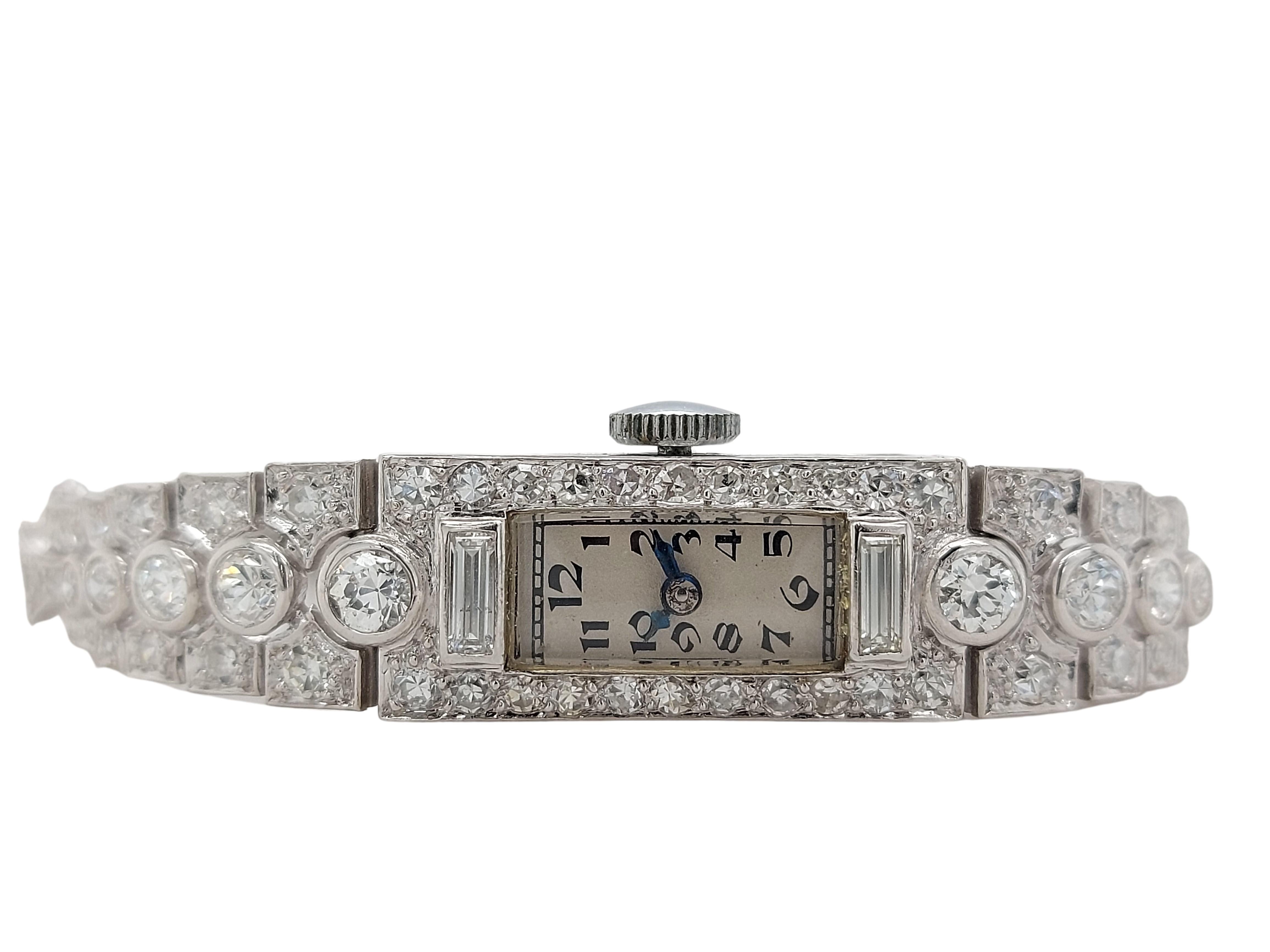 Platinum Lady Wristwatch With Old Cut / Baguette Cut Diamonds

Movement: mechanical hand winding

Functions: Hours, Minutes

Case: Platinum, mineral glass, 21 x 9 mm, set with old cut and baguette cut diamonds

Dial: white with arabic