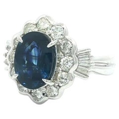 Platinum Large 5.19ctw GIA Oval Royal Blue Sapphire w/ Diamond Halo Ring