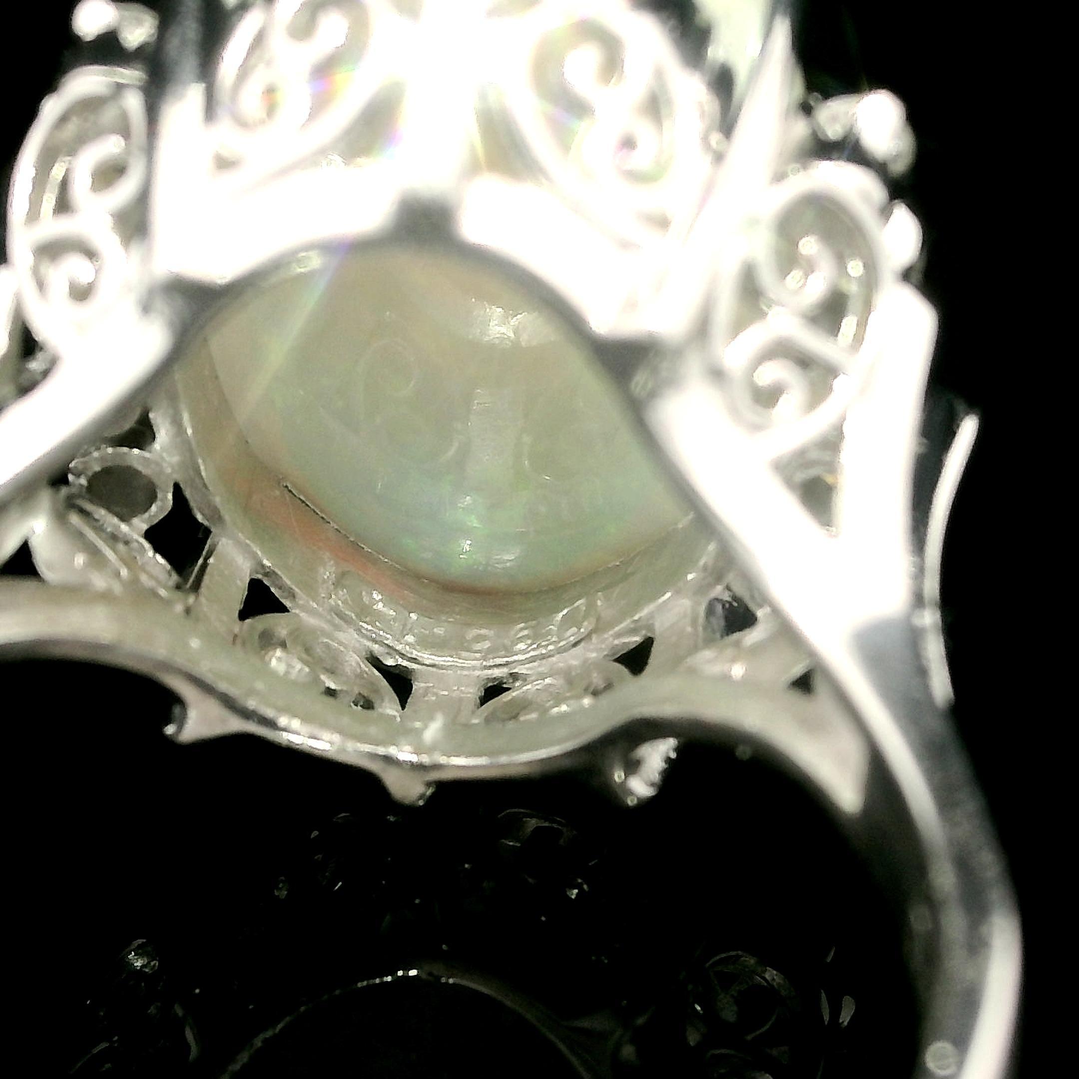 Platinum Large 6.98ctw Oval Cabochon Opal & Diamond Open Work Gallery Ring In Excellent Condition For Sale In Montclair, NJ