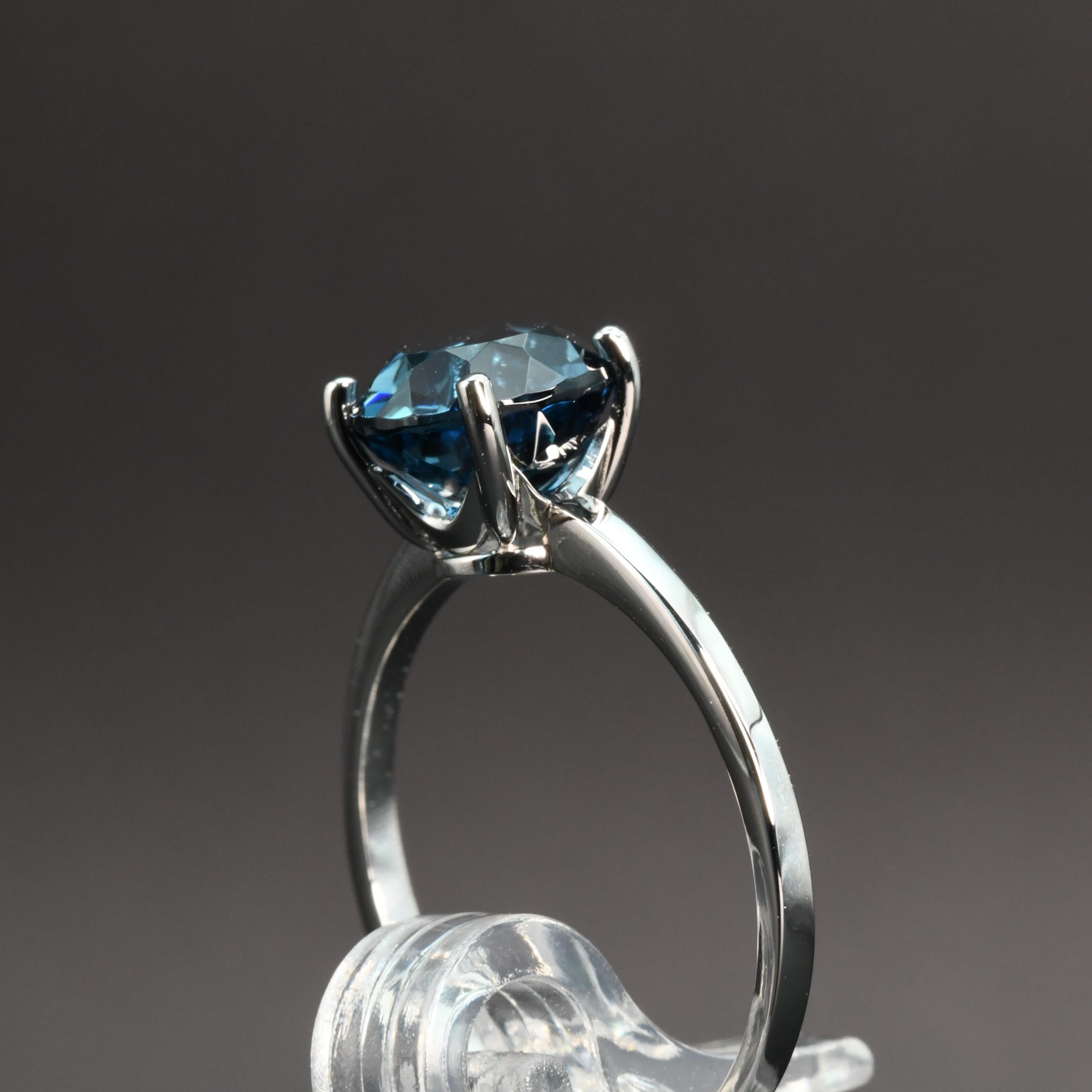 Round Cut Platinum London Blue Topaz Ring For Sale