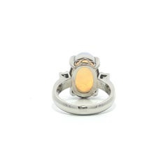 Platinum Long Elongated Colorful Play of Color Oval Opal Diamond Sides Ring