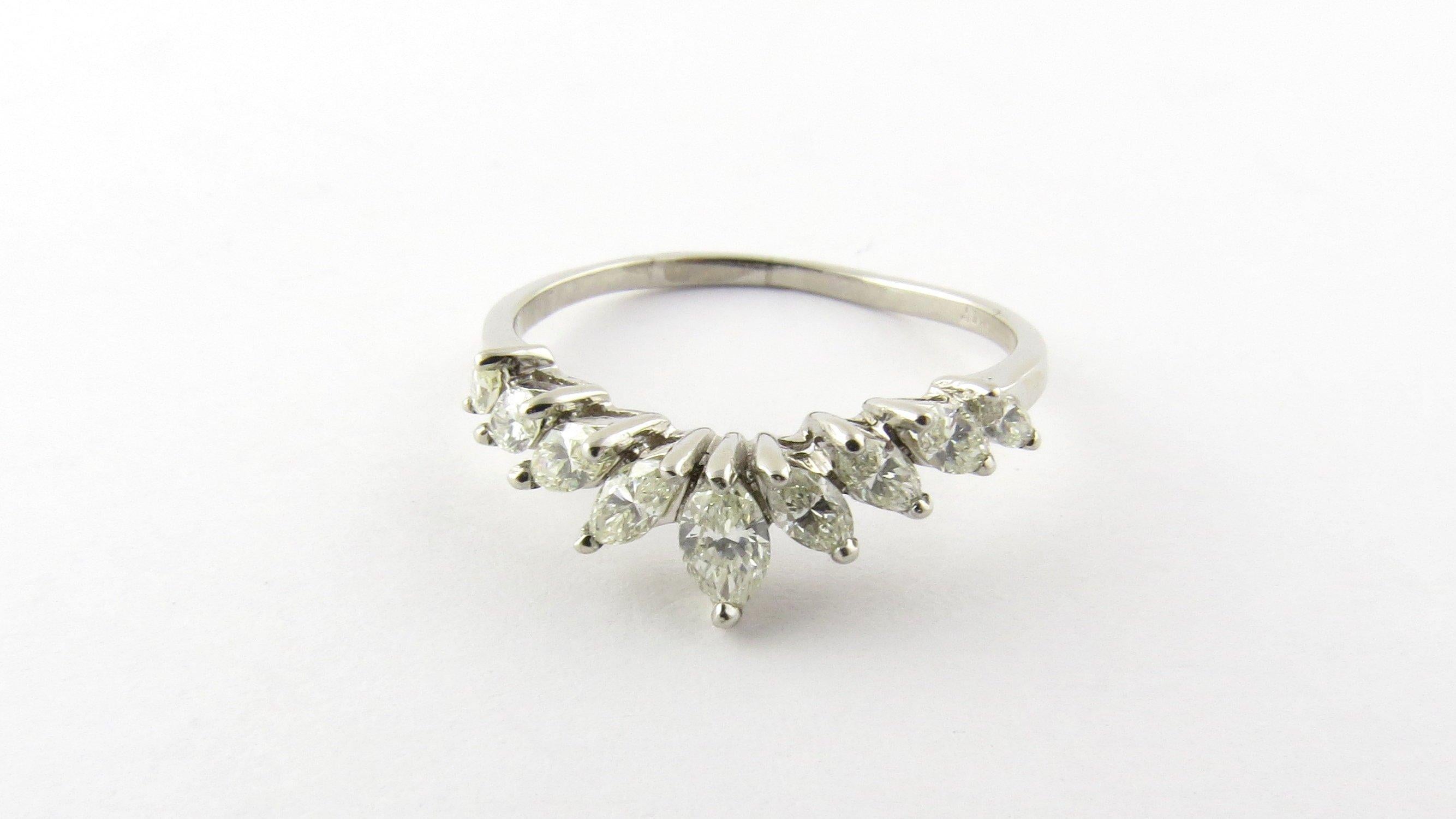 Vintage Platinum Marquis Diamond Ring Size 8.75 
This elegant ring features nine graduated marquis diamonds set in classic platinum. Shank measures 1 mm. 
Approximate total diamond weight: .40 ct. 
Diamond color: K-L 
Diamond clarity: SI1 
Ring