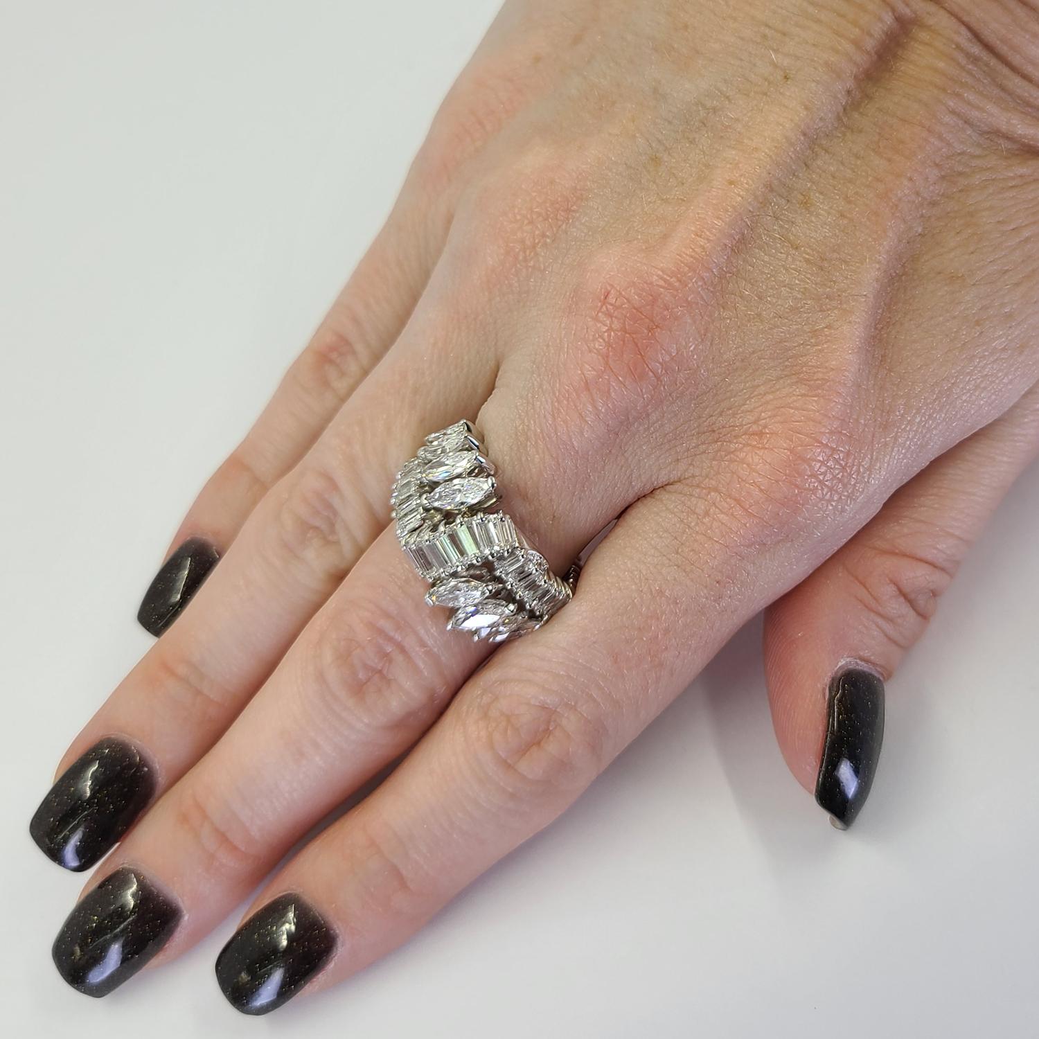 Platinum Diamond Band Featuring 48 Baguette & Marquise Cut Diamonds Of VS Clarity & G Color Totaling Approx. 4 Carats. Finger Size 7. Finished Weight Is 9.4 Grams.