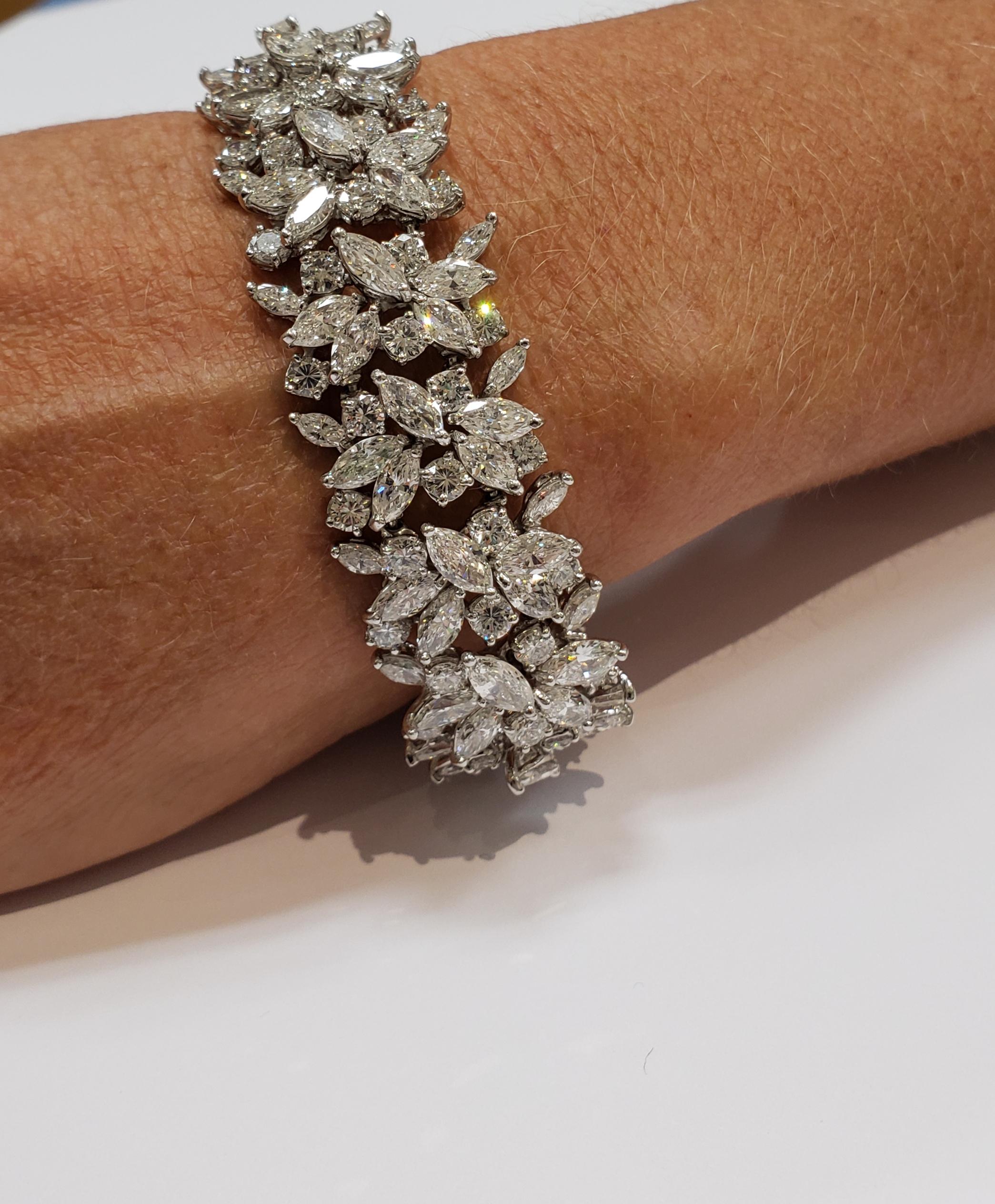 A gorgeous platinum, marquise and round diamond cocktail bracelet.
Approximately 28 carats of prong set diamonds, in a floral like design.
Bracelet is from mid-century, late 1950's-mid 1960's.
An elegant look from a time gone by.
Length is 7.5