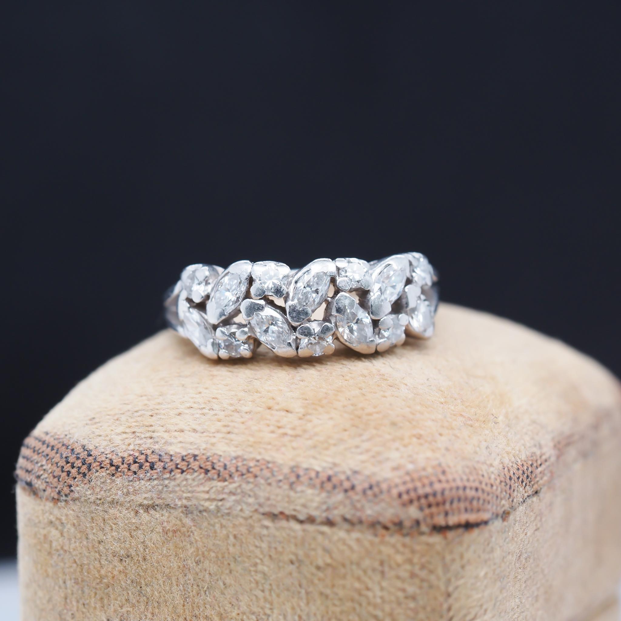Item Details:
Ring Size:5.5
Metal Type: Platinum [Hallmarked, and Tested]
Weight: 5.7 grams
‌
Diamond Details:
Weight: .75ct, total weight
Cut: Marquise & Round Brilliant
Clarity: F-G
Color: VS
‌
Band Width: 1.9 mm
Condition: Excellent