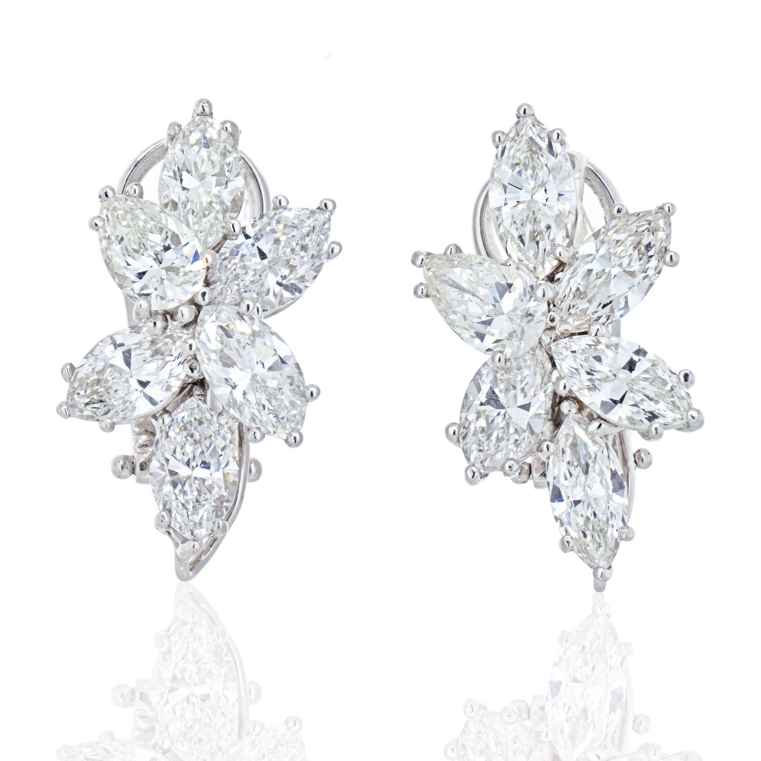 Beautiful diamond clip on cluster earrings that are not too big and not too small. Just perfect. 

Comprised of pear and marquise cut diamonds these lovely diamond ear-clips are perfect for a special event, gala or big celebration. 

Very often