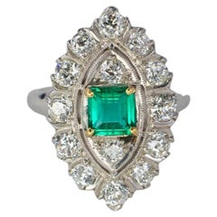 Platinum Marquise-Shaped Emerald and Old Mine Cut Diamond Cluster Ring